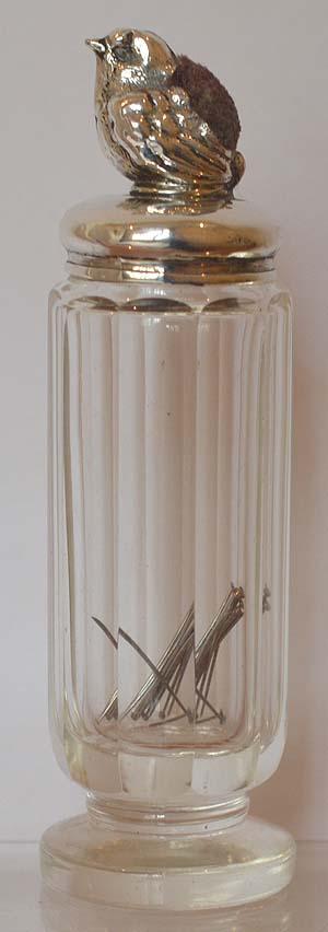 SILVER EDWARDIAN BIRD PIN CUSHION WITH ORIGINAL GLASS PIN HOLDER COMBINATION.