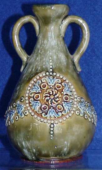 DECORATIVE TWIN HANDLE VASE.