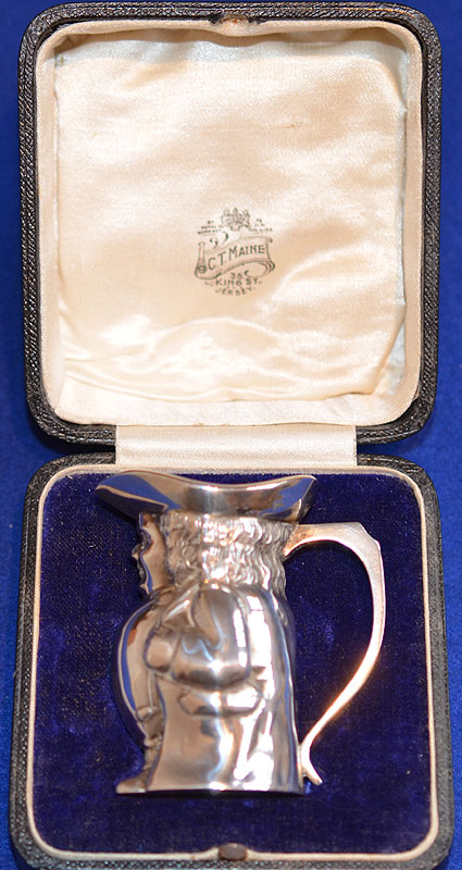 CASED MINIATURE SILVER HALLMARKED TOBY JUG.