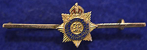 9ct GOLD BRITISH GUARDS REGIMENT'S BADGE.