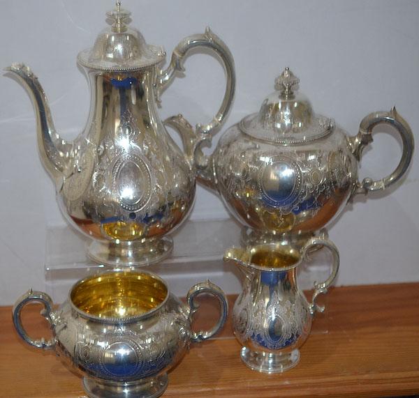 A LARGE MID VICTORIAN SILVER FOUR PIECE COFFEE AND TEA SET. 