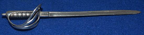 NOVELTY SILVER MINITURE SWORD LETTER OPENER.