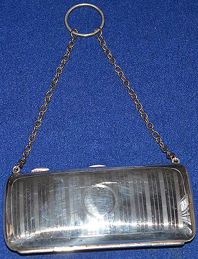 SILVER PURSE AND CHAIN.