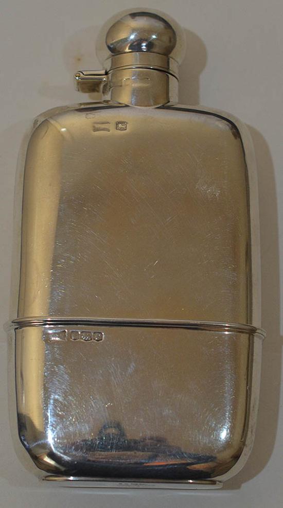 SILVER HIP FLASK WITH MATCHING CUP.