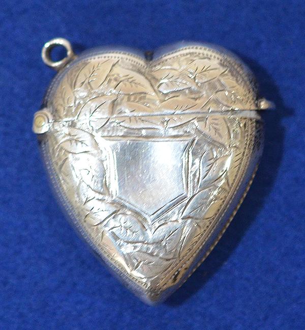 HEART SHAPED  SILVER VESTA CASE.