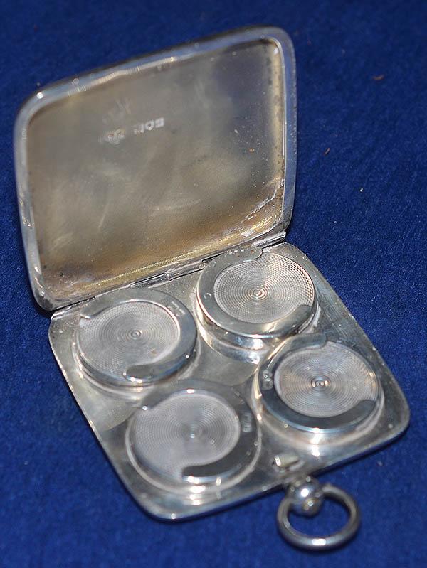 RARE SILVER SOVEREIGN CASE WITH FOUR COIN HOLDERS.