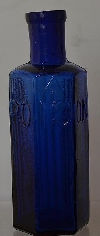 LATE VICTORIAN ADMIRALTY BLUE GLASS POISON BOTTLE.