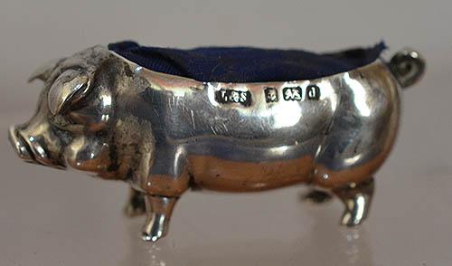 SILVER ANTIQUE PIG PIN CUSHION.