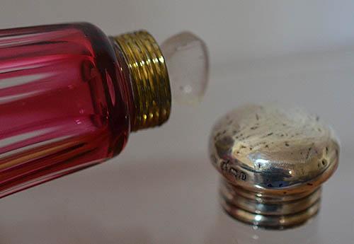 LARGE RUBY GLASS SILVER TOPED SCENT BOTTLE.